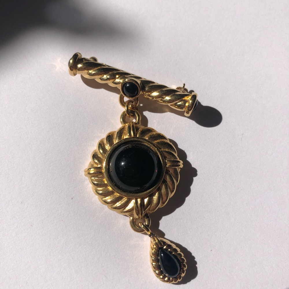 gold and black pin!